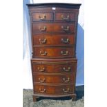 20TH CENTURY MAHOGANY CHEST WITH SHAPED FRONT & 2 SHORT OVER 3 & 3 LONG DRAWERS ON BRACKET SUPPORTS