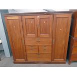 LATE 19TH CENTURY MAHOGANY WARDROBE WITH 2 CENTRALLY SET PANEL DOORS OVER 4 DRAWERS,
