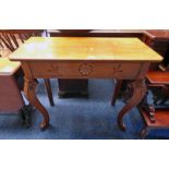 EARLY 20TH CENTURY OAK SIDE TABLE WITH CARVED DECORATION ON SHAPED SUPPORTS