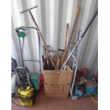 SELECTION OF VARIOUS GARDEN TOOLS TO INCLUDE RAKES, SPADES,