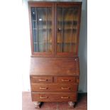 20TH CENTURY OAK BUREAU BOOKCASE WITH 2 GLAZED DOORS OVER FALL FRONT & DRAWERS