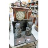 EARLY 20TH CENTURY WALNUT CASED MANTLE CLOCK & PAIR ETHNIC FIGURAL HARDWOOD BOOKENDS