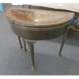 19TH CENTURY MAHOGANY TRIPLE CARD TABLE WITH CARVED DECORATION ON SHAPED SUPPORTS WITH PAD FEET