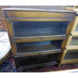 ART DECO OAK BOOKCASE WITH 3 GLASS GLOBE WERNICKE STYLE DOORS - LENGTH 86 CMS