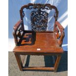 ORIENTAL CARVED HARDWOOD OPEN ARMCHAIR ON SQUARE SUPPORTS 98CM TALL X 62CM WIDE X 47CM DEEP