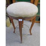 CIRCULAR TOPPED STOOL ON SHAPED SUPPORTS