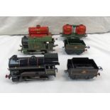 TWO HORNBY 0 GAUGE CLOCKWORK 0-4-0 STEAM LOCOMOTIVES & TENDERS AND SEVERAL WAGONS