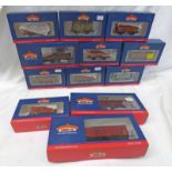 TWELVE BACHMANN 00 GAUGE WAGONS INCLUDING 37-209 8 PLANK WAGON WITH COKE RAIL BR 'P' REFURBISHED