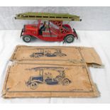 METTOY TINPLATE CLOCKWORK FIRE ENGINE WITH LITHOGRAPED RED BODY, FOUR FIREMAN AND LADDER,