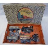 HORNBY O GAUGE NO O GOODS SET CONTAINING 0-4-0 LMS 2710 LOCOMOTIVE WITH LMS, GW AND PULLMAN COACH,