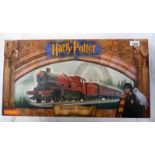 HORNBY R1025 00 GAUGE HARRY POTTER AND THE PHILOSOPHERS STONE HOGWARTS EXPRESS ELECTRIC TRAIN SET.
