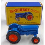 MATCHBOX LESNEY 1-75 SERIES FORDSON MAJOR TRACTOR WITH ORANGE FRONT & REAR HUBS AND A BLUE BODY.