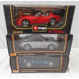 THREE BURAGO/MAISTO 1:18 SCALE MODEL CARS INCLUDING JAGUAR XK180 TOGETHER WITH PORSCHE 911 CARRERA