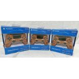 THREE SONY PLAYSTATION DUALSHOCK 4 BOXED CONTROLLERS
