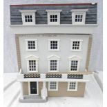 FOUR STOREY DOLLS HOUSE WITH ACCESSORIES.