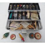 SELECTION OF FISHING RELATED ITEMS TO INCLUDE SEVERAL METAL LURES, SPINNERS, LEAD WEIGHTS,