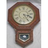 MAHOGANY CASED LATE 19TH CENTURY WALL CLOCK WITH CARVED DECORATION.