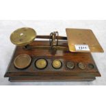 SET OF EARLY 20TH CENTURY OAK AND BRASS SCALES AND WEIGHTS