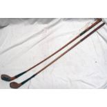 2 SCARED HEAD GOLF CLUBS ONE BY WM HENDERSON AND ONE BY A KNOX