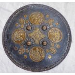 AN INDO-PERSIAN DHAL SHIELD, 46CM ACROSS, 4 CIRCULAR BRASS DISCS DECORATED WITH FIGURES,