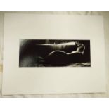 UNFRAMED PRINT OF A RECLINING NUDE BY KEN WALKER