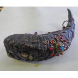 TRIBAL GOURD DECORATED WITH COLOURED PIGMENTS, BRASS INSERTS ON A ANIMAL HORN BODY,