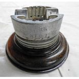 A ROYAL NAVY MTB (MOTOR TORPEDO BOAT) PISTON ASH TRAY ON WOODEN BASE