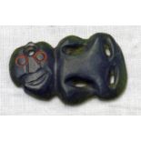 A NEPHRITE GREEN HARDSTONE TIKI, 3.