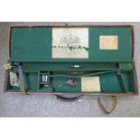 A LEATHER GUN CASE WITH CHARLES LANCASTER GUN MANUFACTURER LONDON LABEL TO INTERIOR,