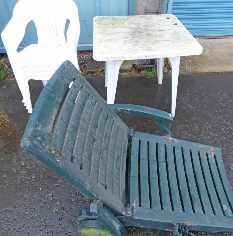 PLASTIC CHAIRS AND TABLE AND A GREEN PLASTIC GARDEN CHAIR