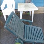 PLASTIC CHAIRS AND TABLE AND A GREEN PLASTIC GARDEN CHAIR