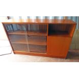 20TH CENTURY TEAK BOOKCASE WITH SLIDING GLASS DOOR & 1 PANEL DOOR,