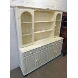 WHITE 2 PART BOOKCASE WITH SHELVES OVER 4 DRAWERS WITH 4 DOORS BELOW OPENING TO SHELVED INTERIOR