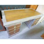 HARDWOOD DESK WITH CENTRALLY SET DRAWER FLANKED BY 2 COLUMNS OF 3 DRAWERS,