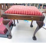 MAHOGANY RECTANGULAR STOOL WITH SHAPED BALL AND CLAW SUPPORTS