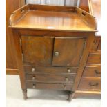 19TH CENTURY MAHOGANY GALLERY TOP CABINET WITH 2 PANEL DOORS OVER 3 DRAWERS ON TURNED SUPPORTS