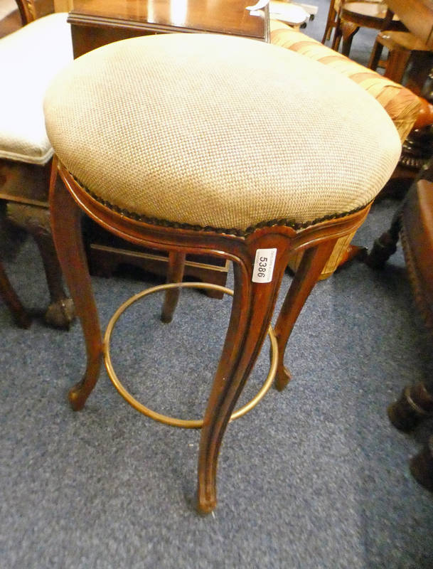 CIRCULAR TOPPED STOOL ON SHAPED SUPPORTS