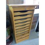 EARLY 20TH CENTURY OAK ROLL FRONT CABINET WITH FITTED DRAWERS,