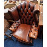 20TH CENTURY BROWN LEATHER BUTTON WINGBACK ARMCHAIR ON QUEEN ANNE SUPPORTS