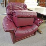 RED LEATHER RECLINING ARMCHAIR & STOOL