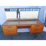 20TH CENTURY MAHOGANY DRESSING TABLE WITH 2 DRAWERS TO EITHER SIDE ON TAPERED SUPPORTS,