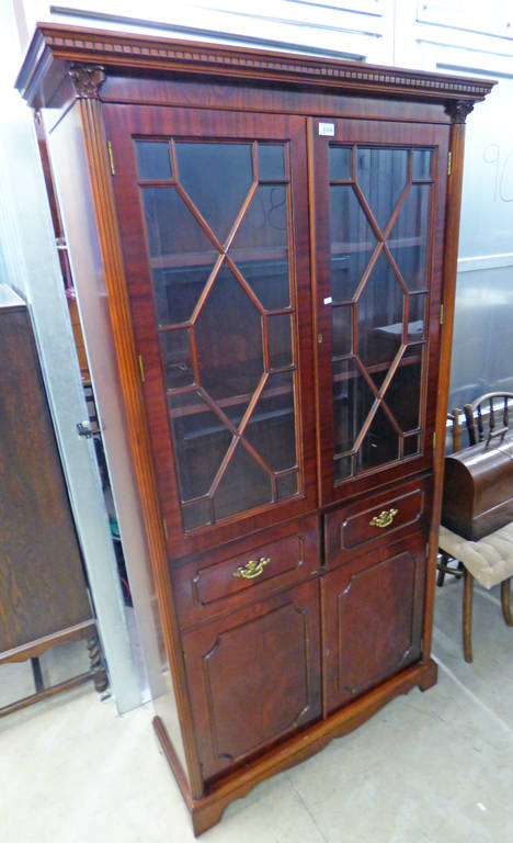 LATE 20TH CENTURY MAHOGANY BOOKCASE WITH 2 ASTRAGAL GLAZED DOORS OVER 2 DRAWERS & 2 PANEL DOORS ON