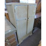 ARTS & CRAFTS LIMED OAK CABINET WITH 2 PANEL DOORS OPENING TO FITTED INTERIOR OVER SINGLE DRAWER,