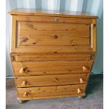 20TH CENTURY PINE BUREAU WITH FALL FRONT OVER 4 DRAWERS, ON BUN FEET,