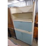 EASTHAM KITCHEN CABINET WITH FALL FRONT OVER 2 PANEL DOORS OPEN TO FITTED INTERIOR