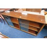 20TH CENTURY MAHOGANY BOOKCASE WITH 4 GLASS SLIDING DOORS OPENING TO SHELVED INTERIOR.