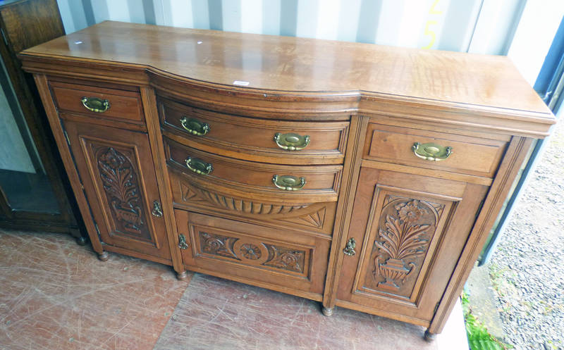 LATE 19TH/EARLY 20TH CENTURY OAK SIDEBOARD WITH BOW FRONT & 4 DRAWERS OVER 3 ART NOUVEAU CARVED