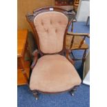 LATE 19TH CENTURY MAHOGANY GENTLEMAN'S CHAIR WITH DECORATIVE CARVED BACK ON TURNED SUPPORTS