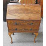 20TH CENTURY MAHOGANY BUREAU WITH FALL FRONT OVER 2 DRAWERS ON SHAPED SUPPORTS