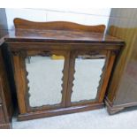 19TH CENTURY ROSEWOOD SIDE CABINET WITH 2 GLASS PANEL DOORS OPENING TO SHELVED INTERIOR ON PLINTH